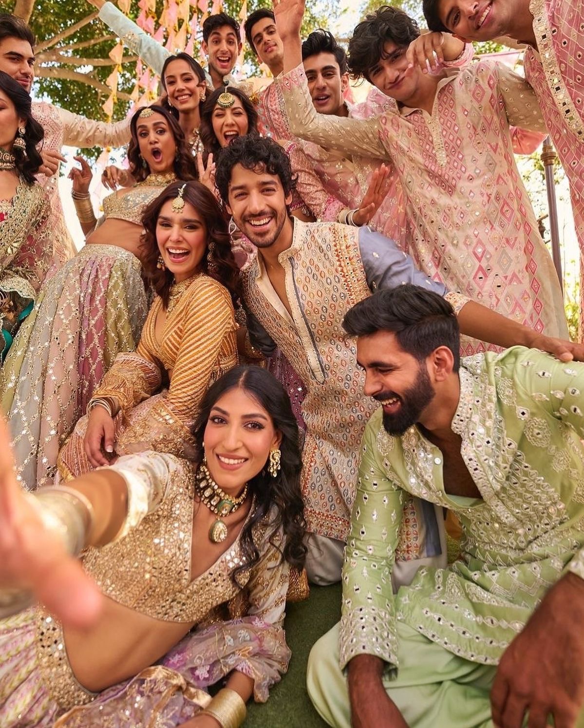 Friends gathering for a joyful Pakistani celebration